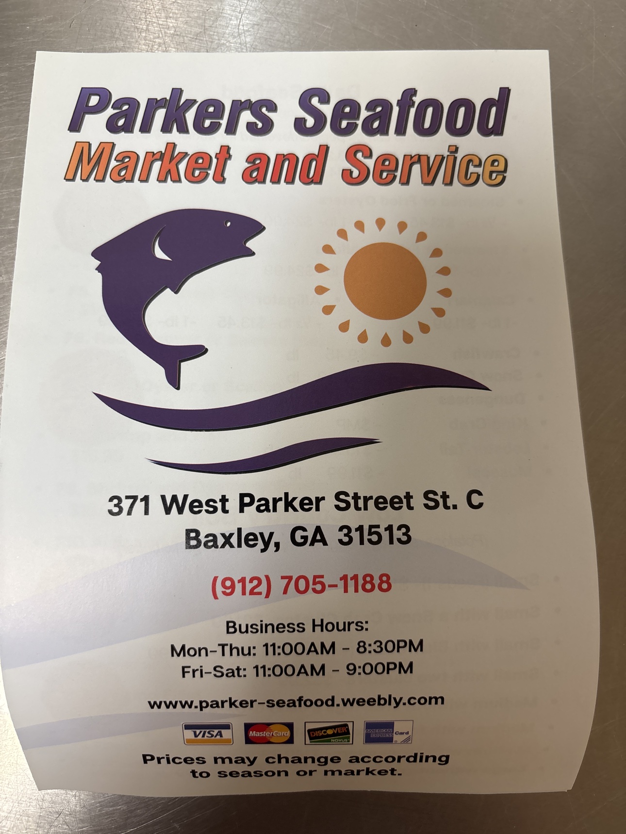 The Parkers Seafood Market and Service flyer with its purple fish and orange sun logo, address and phone number